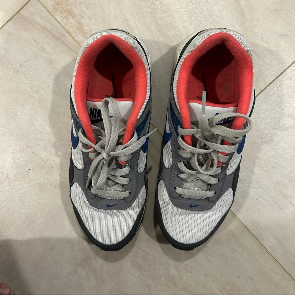 Nike Air Sneakers - Gray, Red, and Blue size 8